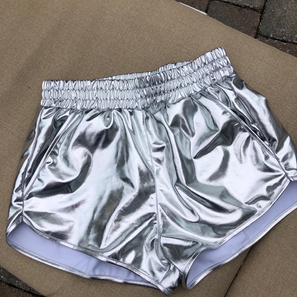 NWOT silver metallic shorts with soft lining